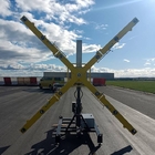 Cruz luminosa móvil para señalizar el cierre de la pista del aeropuerto